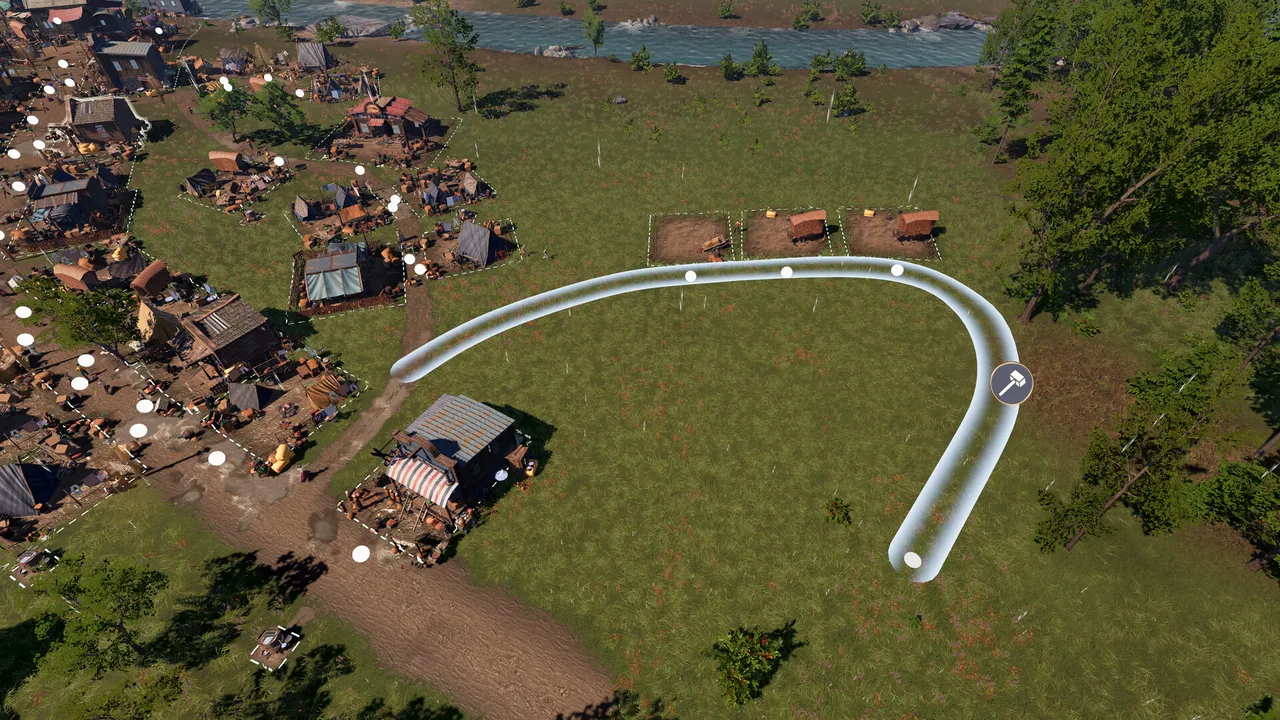 A curved road being drawn across open grass beside a settlement